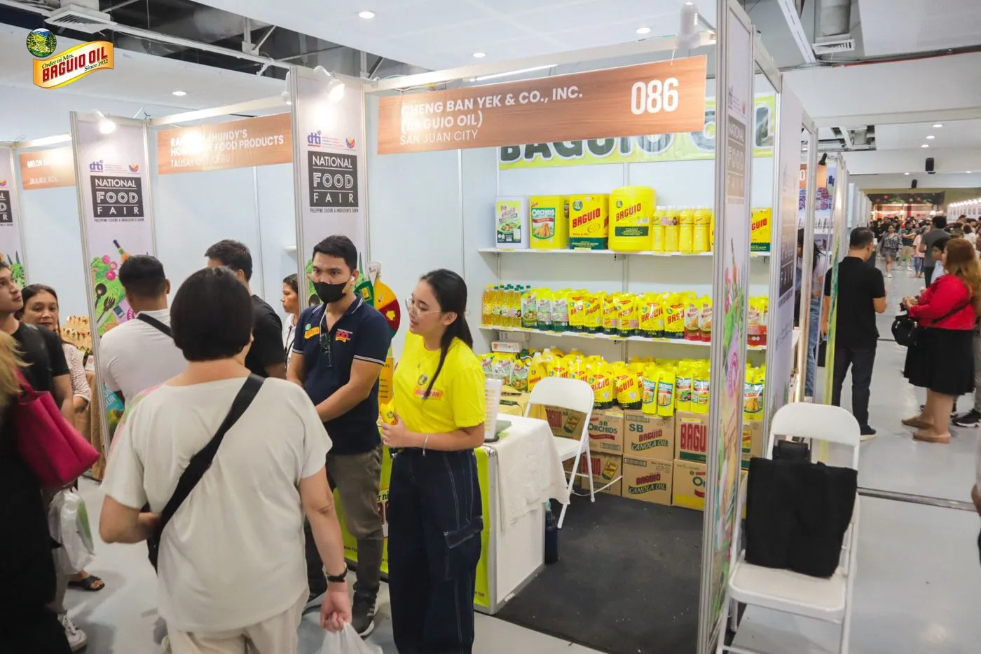 Visitors at the Baguio Oil booth, National Food Fair 2024